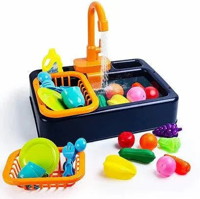 Toy kitchen sink set with colorful utensils and fruits on a white background