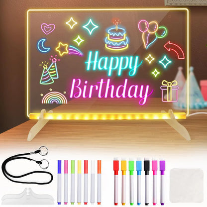 Neon sign with 'Happy Birthday' and various celebratory symbols, accompanied by markers and a cleaning cloth.